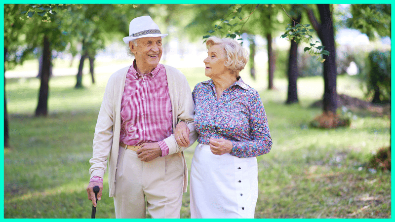 couple walking through park